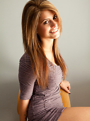Hailey Leigh sitting on chair and showing her sexual body