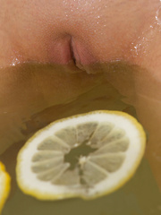 Sexy blonde shows her untouched pussy after a hot lemon bath that lifts her spirit to make the best photos.