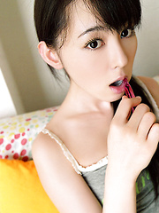 Rina Akiyama Asian with sexy lips rubs her cunt of bar outdoor