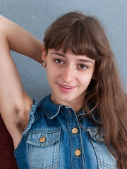 Young WIllow shows off hairy pits and hairy pussy