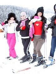 Blindfolded beauty touching her friends damp clits indoors